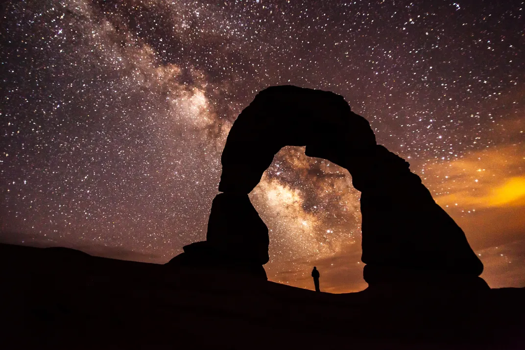 Arch silhouette against night sky
